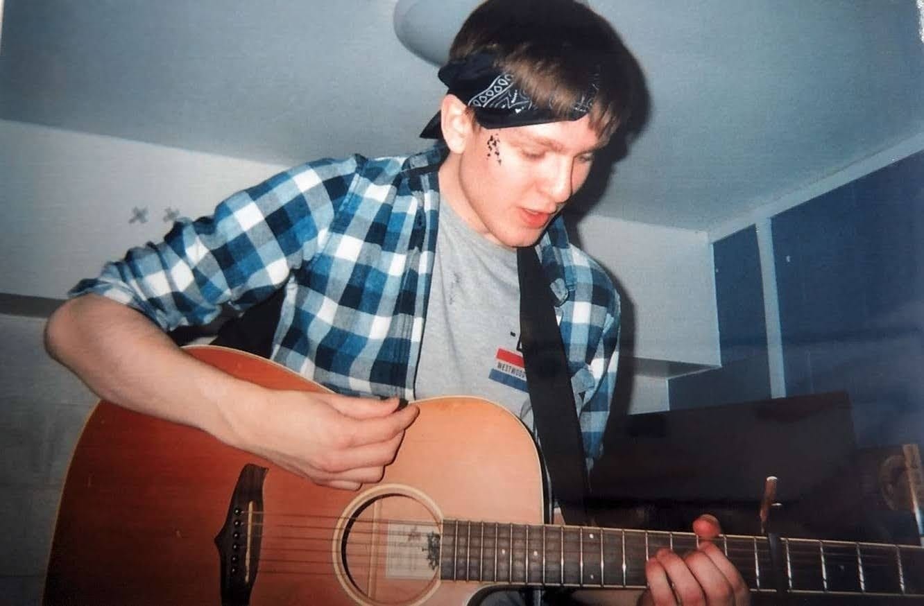 alex playing guitar.jpg